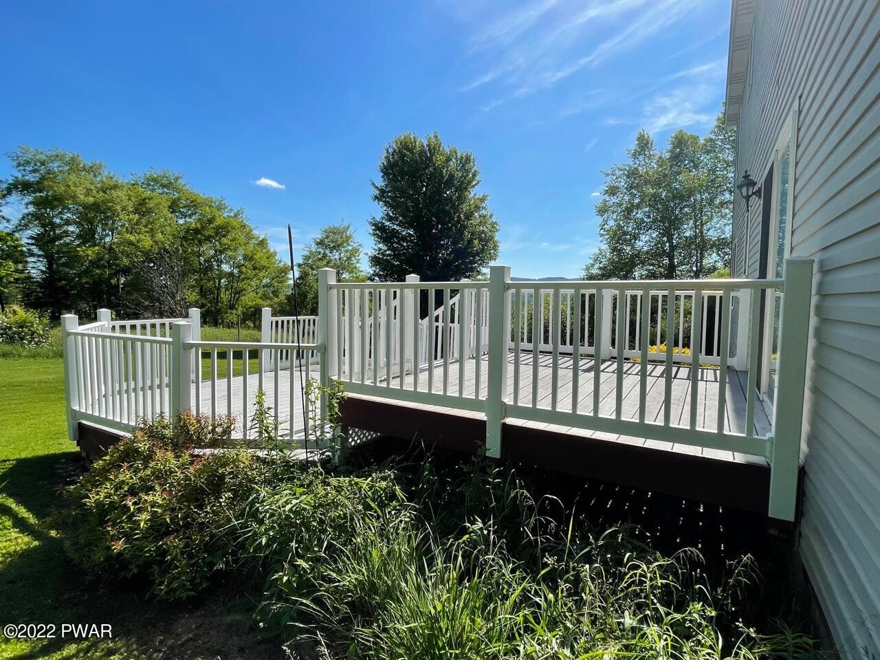 524 Creamton Drive Prompton, PA 18456 - Photo 28 of 57 a view of a garden with wooden fence
