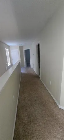 a view of room and bedroom