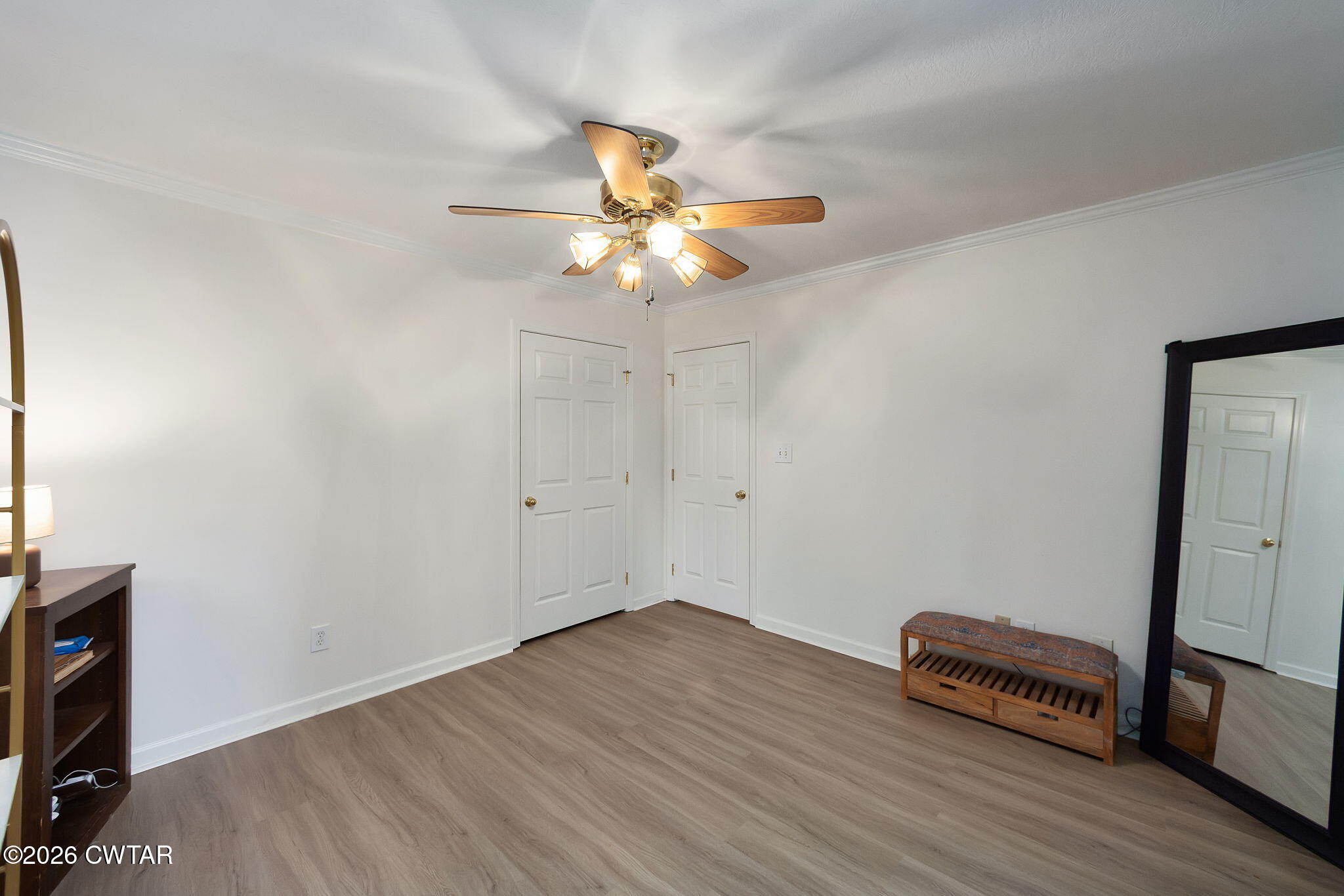 80 Rooker Drive Jackson, TN 38305 - Photo 19 of 30 a view of an empty room with wooden floor