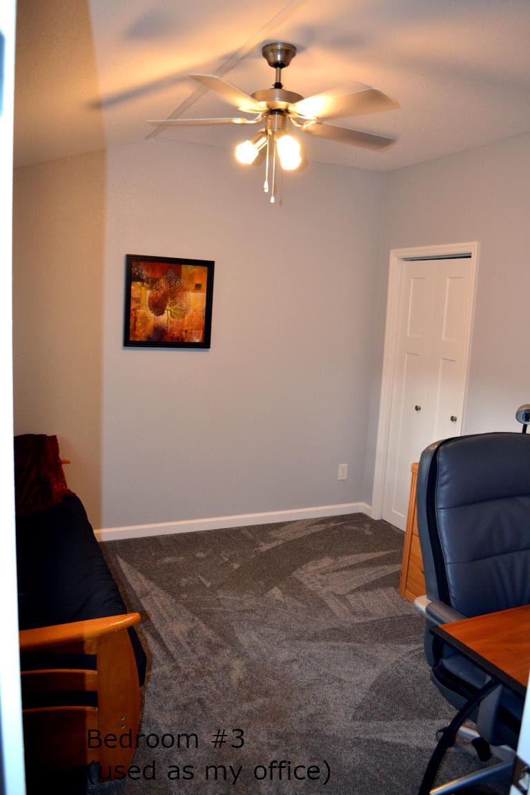 1481 Dutch Valley Road Clinton, TN 37716 - Photo 14 of 24 a living room with furniture and a lamp