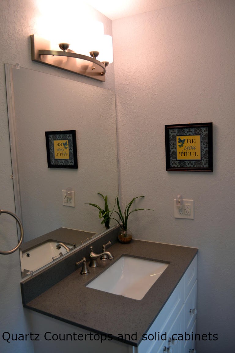1481 Dutch Valley Road Clinton, TN 37716 - Photo 17 of 24 a room with a table chairs and paintings on the wall