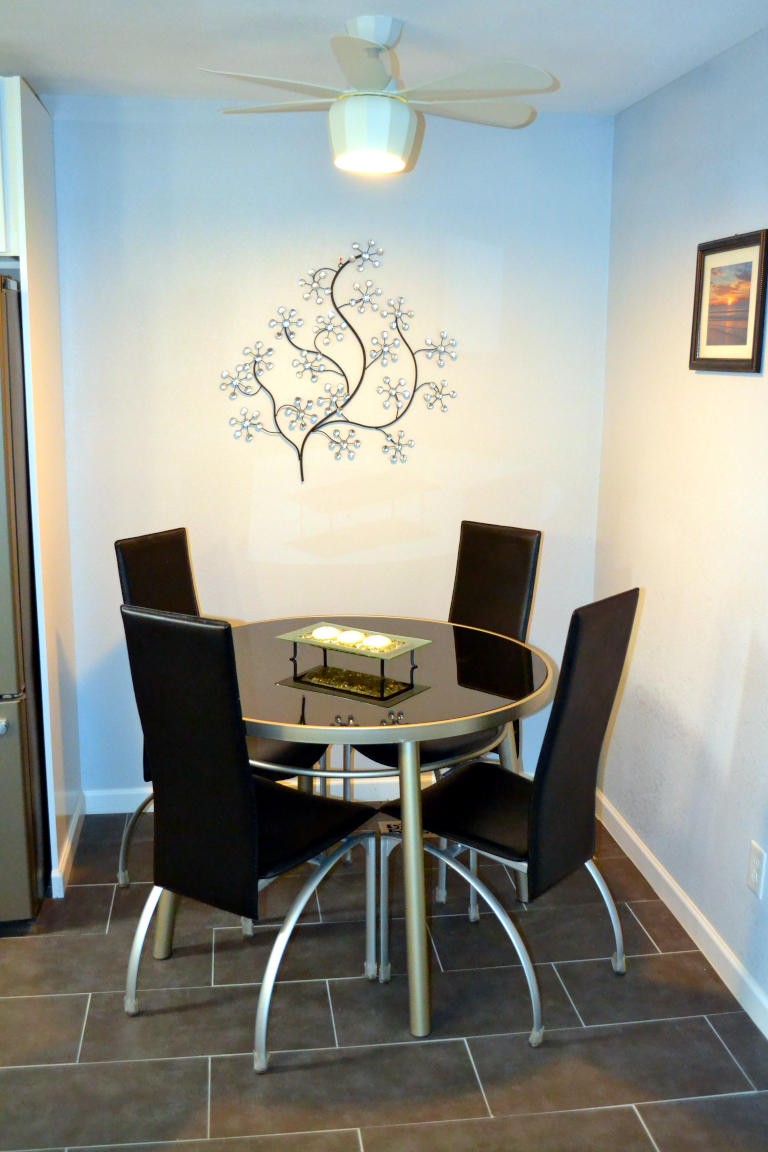 1481 Dutch Valley Road Clinton, TN 37716 - Photo 8 of 24 a view of a dining room with furniture and wooden floor