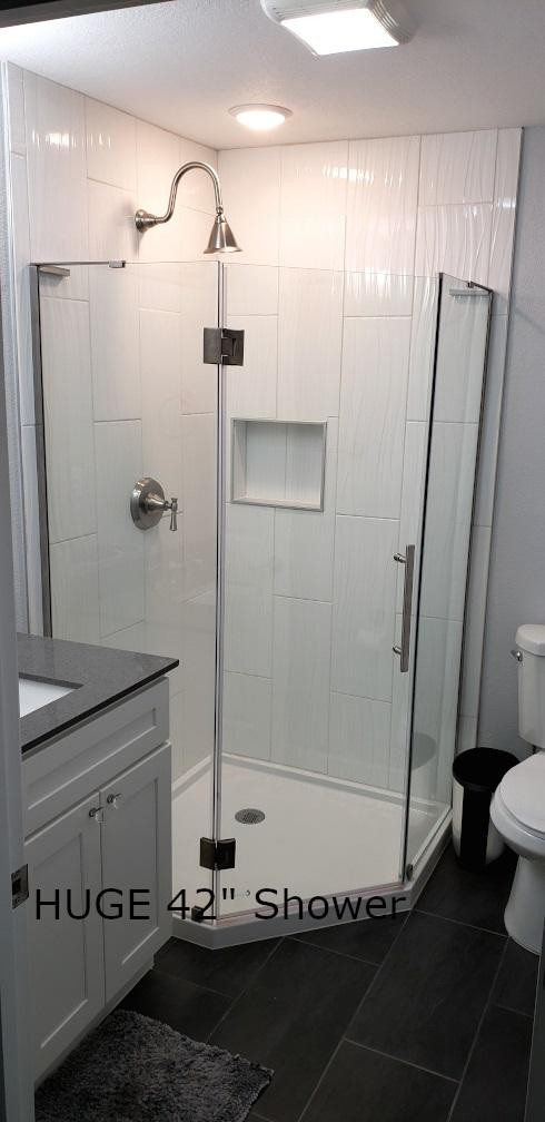 1481 Dutch Valley Road Clinton, TN 37716 - Photo 10 of 24 a bathroom with a shower