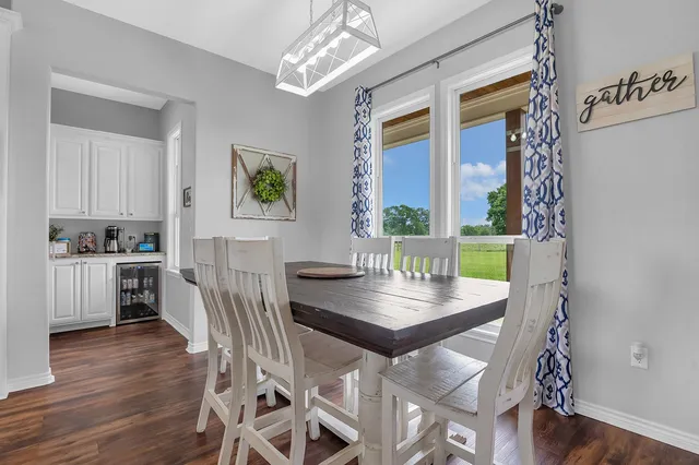 a workspace with furniture and window