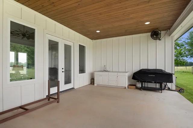 a room with furniture and a window