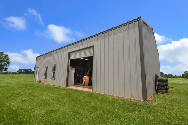 a view of a back yard of the house