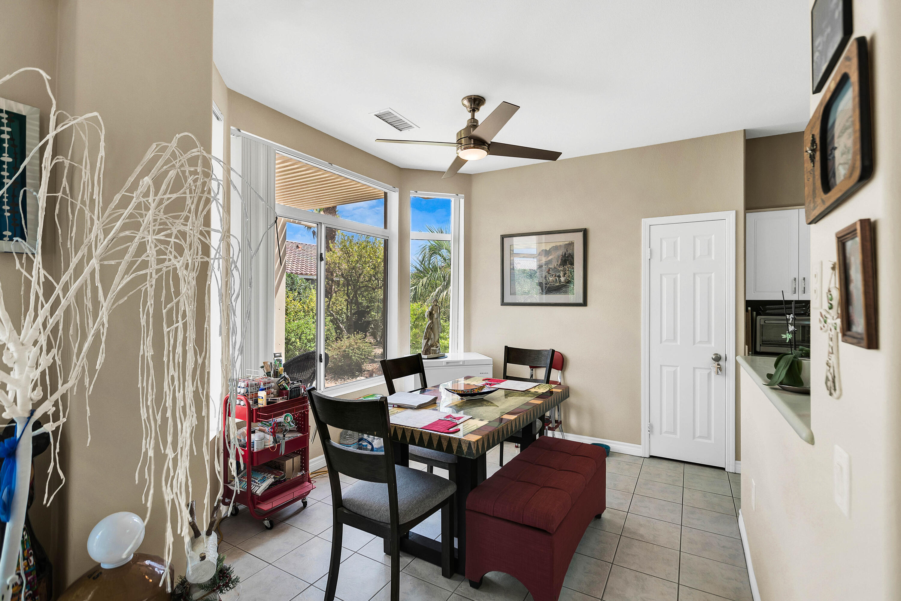 78386 Moongold Road Palm Desert, CA 92211 - Photo 18 of 43 a view of a livingroom with furniture window and a ceiling fan