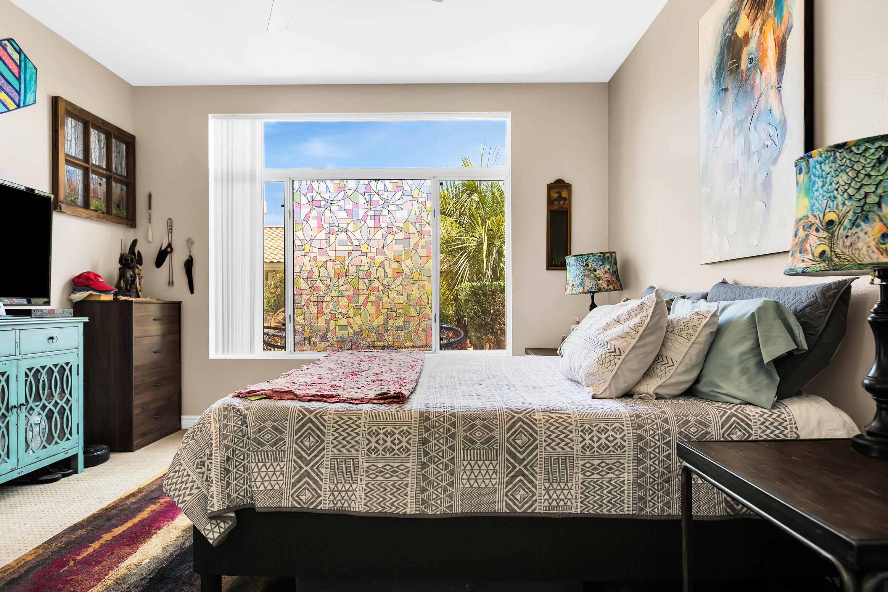 78386 Moongold Road Palm Desert, CA 92211 - Photo 23 of 43 a bedroom with a bed and a window