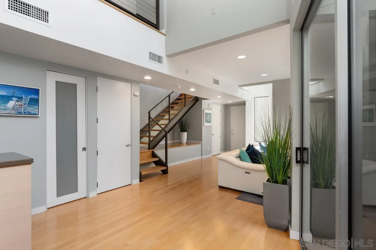 714 Bonair Way La Jolla, CA 92037 - Photo 12 of 36 a living room with furniture and a potted plant