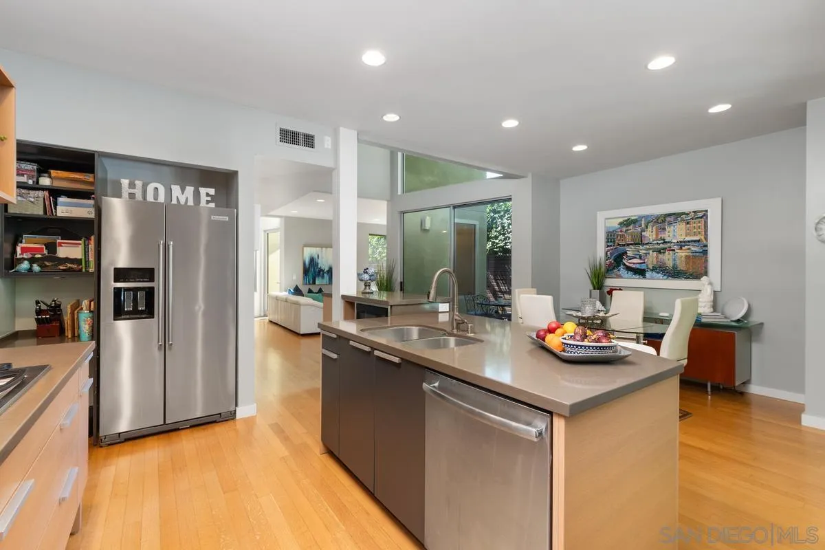 714 Bonair Way La Jolla, CA 92037 - Photo 17 of 36 a kitchen with sink and refrigerator
