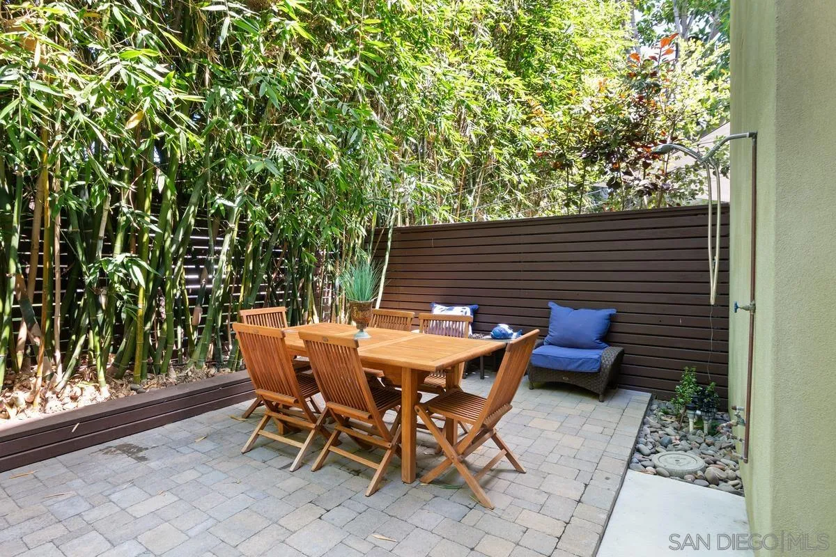 714 Bonair Way La Jolla, CA 92037 - Photo 19 of 36 a backyard of a house with outdoor seating