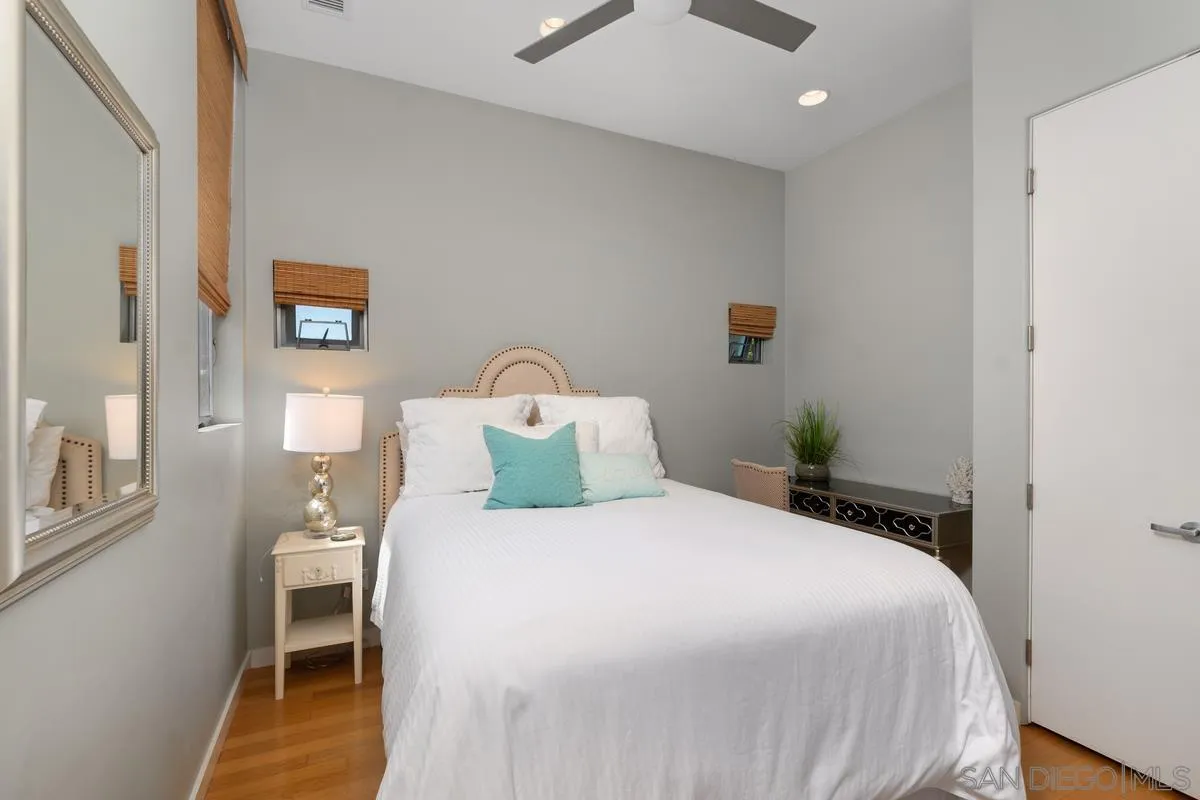 714 Bonair Way La Jolla, CA 92037 - Photo 35 of 36 a bedroom with a bed and a lamp