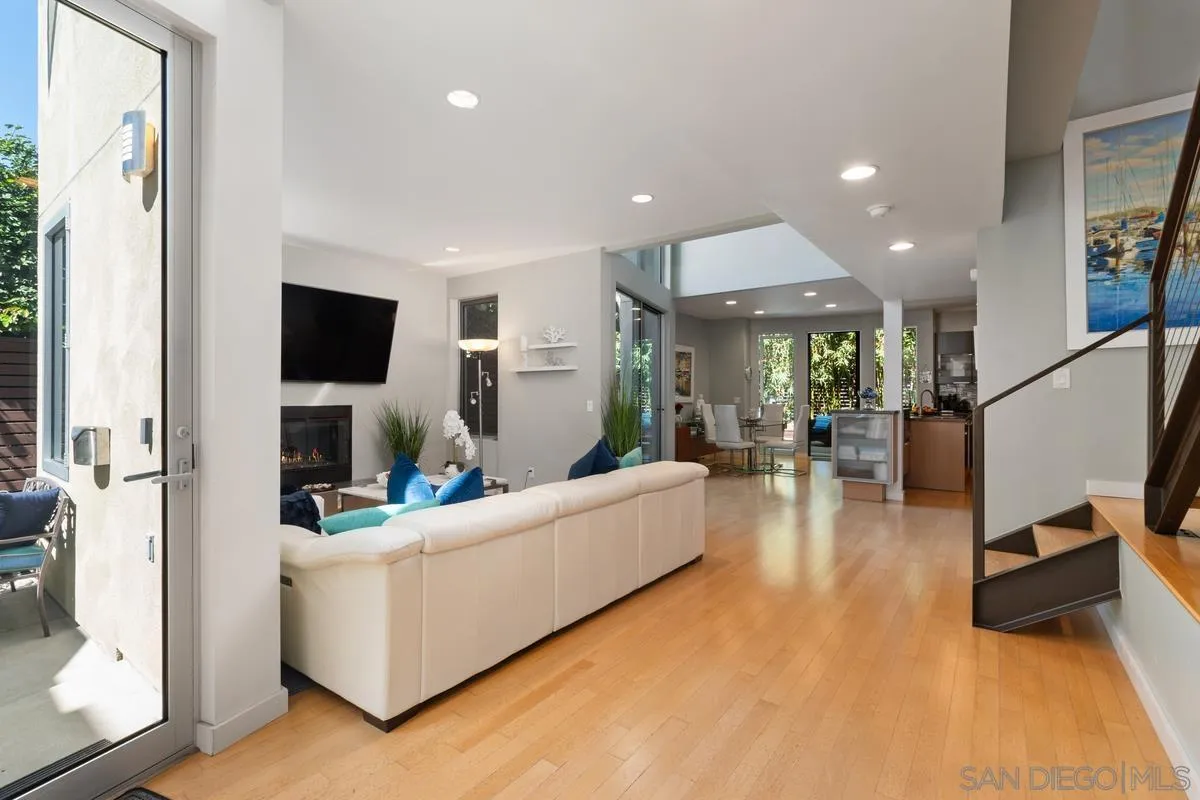 714 Bonair Way La Jolla, CA 92037 - Photo 7 of 36 a living room with furniture and a flat screen tv