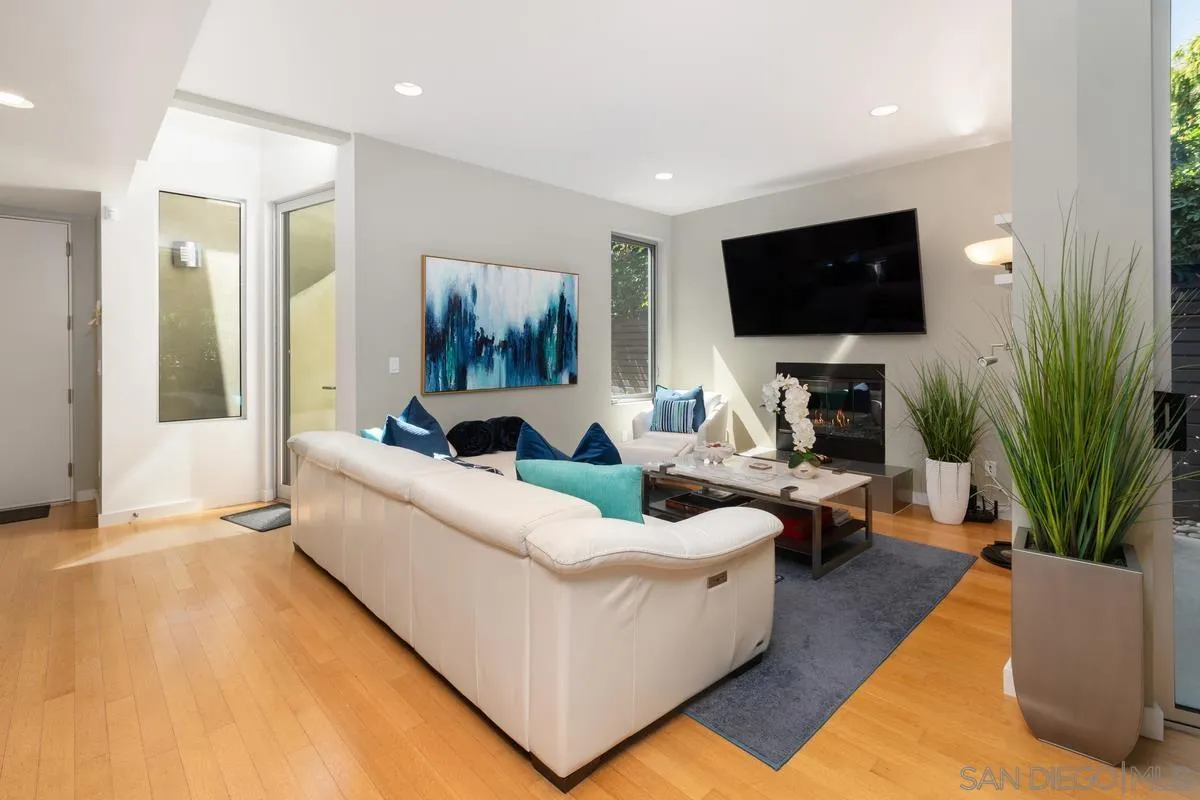 714 Bonair Way La Jolla, CA 92037 - Photo 9 of 36 a living room with furniture and a flat screen tv