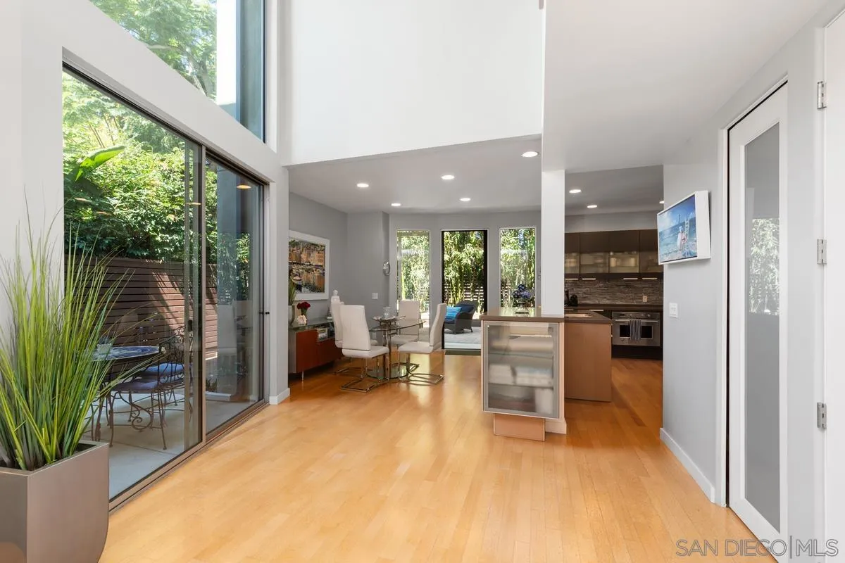 714 Bonair Way La Jolla, CA 92037 - Photo 10 of 36 a living room with furniture a large window with kitchen view