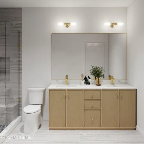 a bathroom with a sink a toilet and mirror