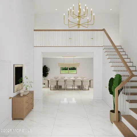 a living room with furniture flowerpot and a potted plant