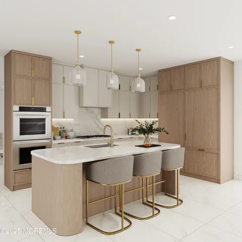 a kitchen with stainless steel appliances a dining table chairs and sink