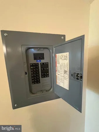 a front view of a house with grey walls