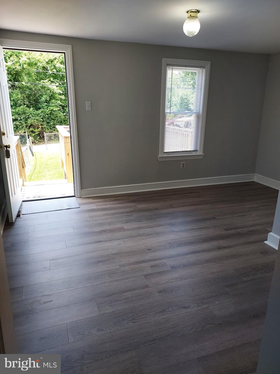 4506 Post Road Marcus Hook, PA 19061 - Photo 8 of 22 Large Mudroom with Back Door Access to Deck & Yard