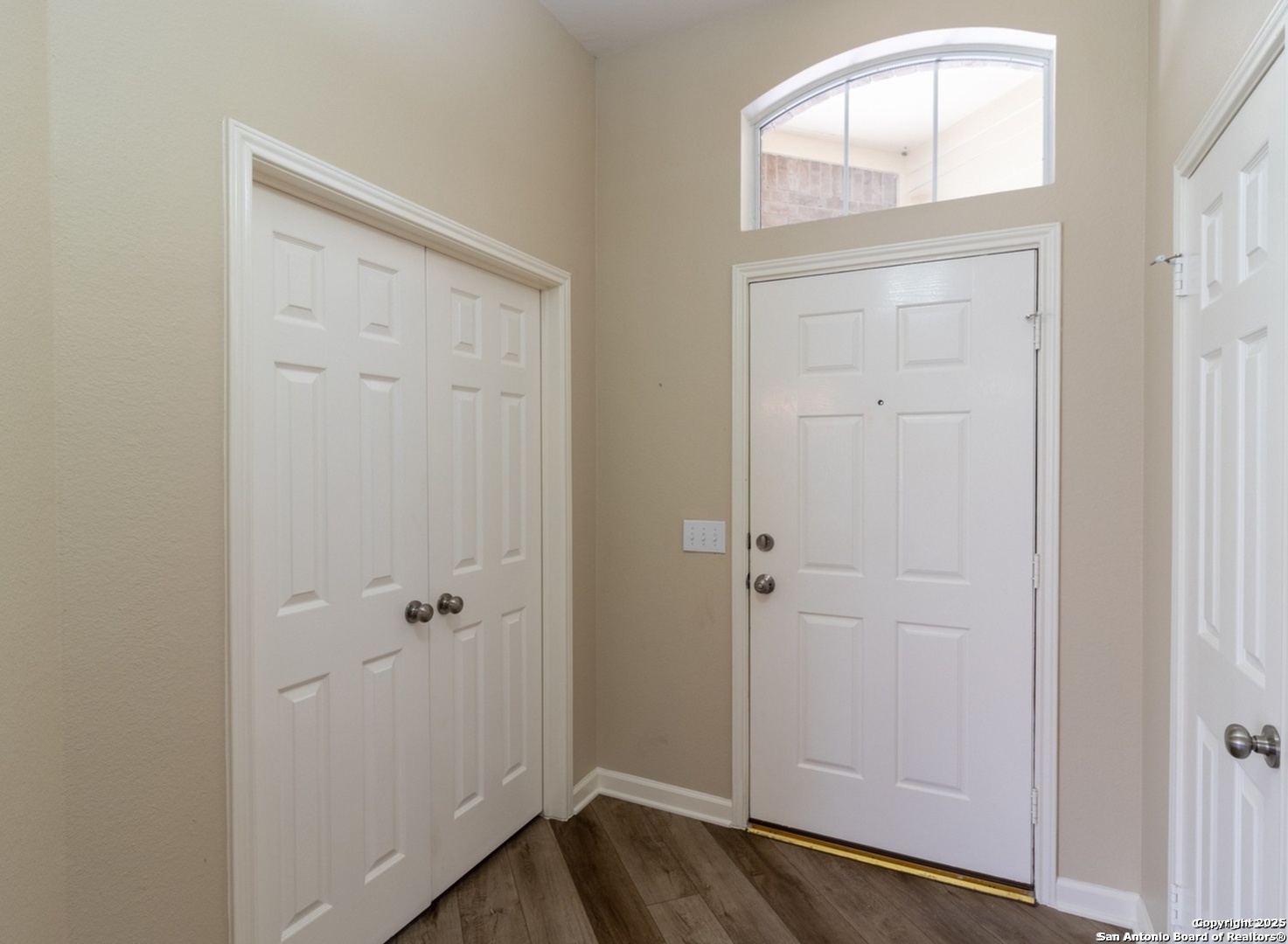 716 Broadleaf Schertz, TX 78154 - Photo 11 of 25 an empty room with wooden floor closet and windows