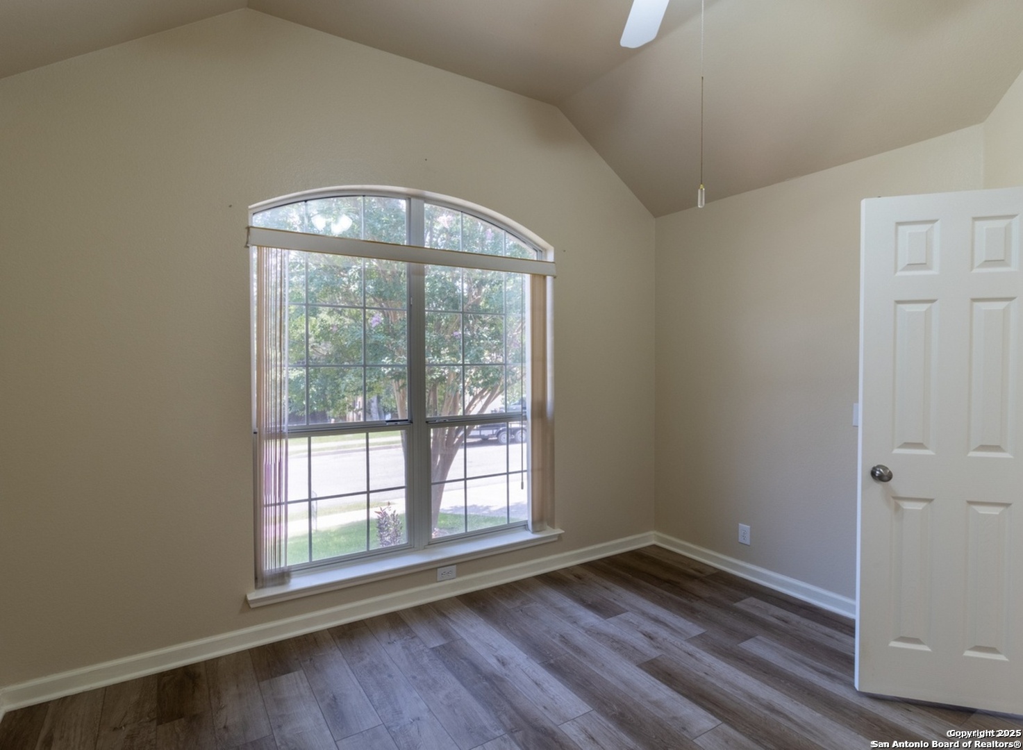 716 Broadleaf Schertz, TX 78154 - Photo 12 of 25 an empty room with wooden floor and windows