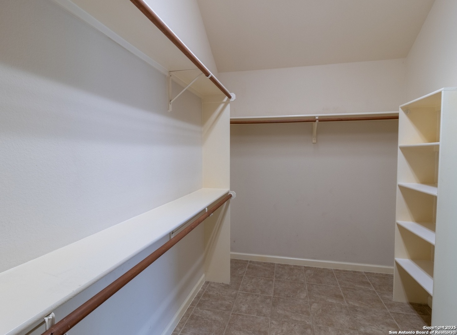 716 Broadleaf Schertz, TX 78154 - Photo 18 of 25 a view of an empty walk in closet
