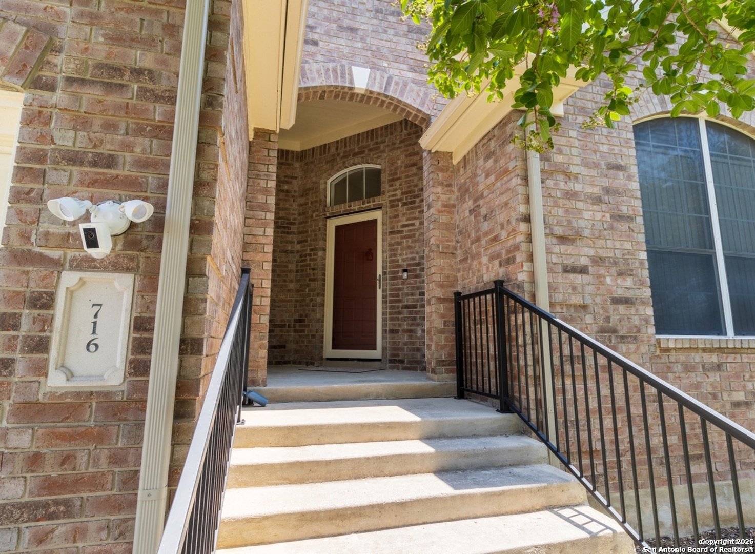 716 Broadleaf Schertz, TX 78154 - Photo 2 of 25 a view of a brick wall of the building