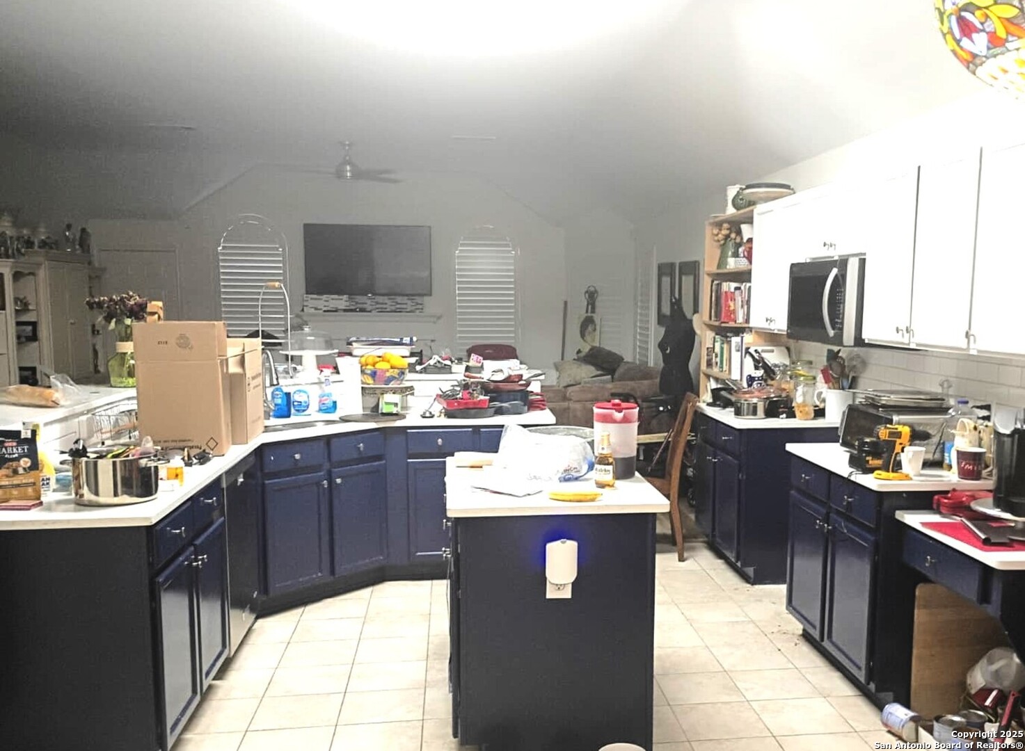 716 Broadleaf Schertz, TX 78154 - Photo 8 of 25 a kitchen with a sink a stove and cabinets