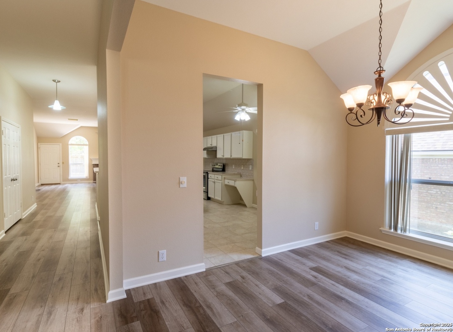 716 Broadleaf Schertz, TX 78154 - Photo 9 of 25 wooden floor in an empty room and a window