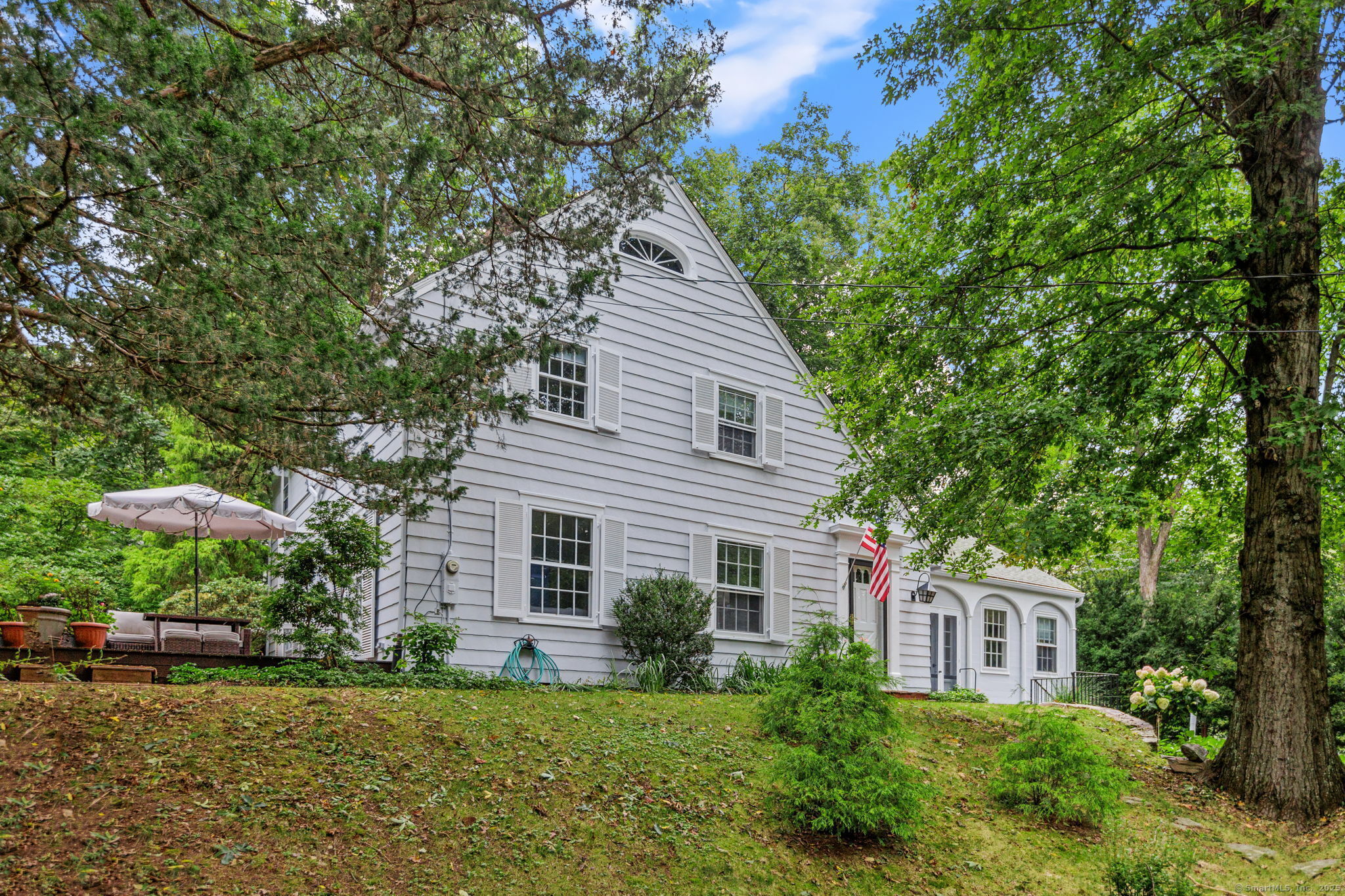 a house view with a garden space