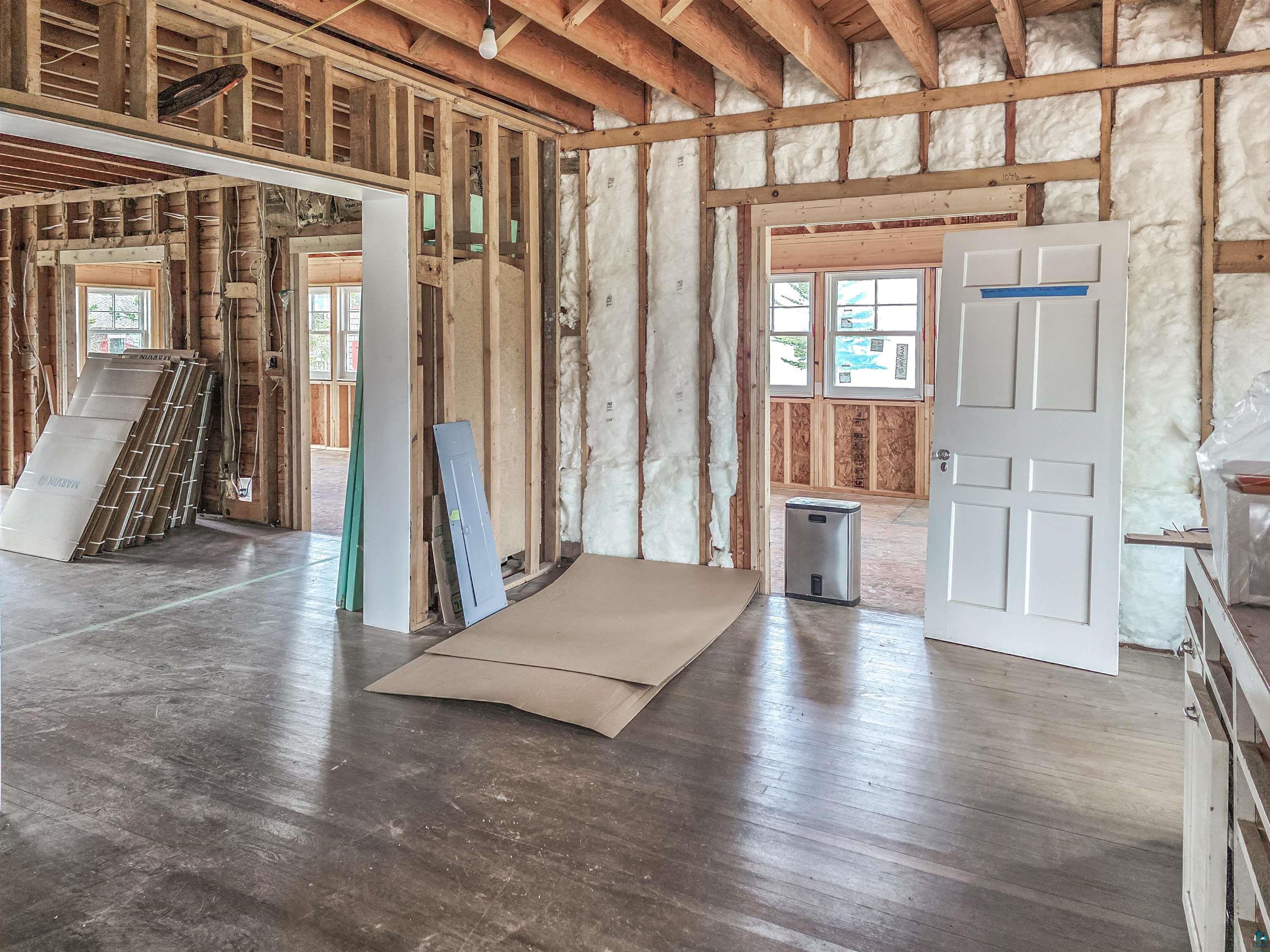 939 Whitefish Street La Pointe, WI 54850 - Photo 17 of 30 Interior framing featuring exposed wooden beams and insulation