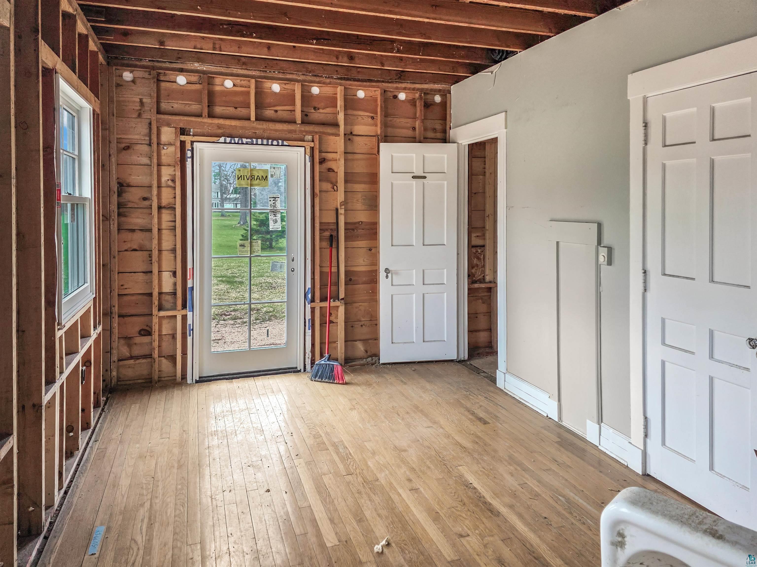 939 Whitefish Street La Pointe, WI 54850 - Photo 19 of 30 Hardwood flooring throughout, offering a versatile foundation