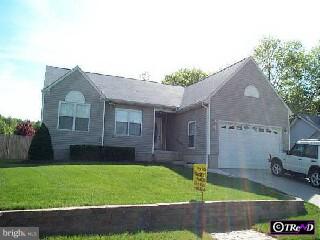 16 Pelham Road Marlton, NJ 08053 - Photo 1 of 1 a front view of a house with a yard