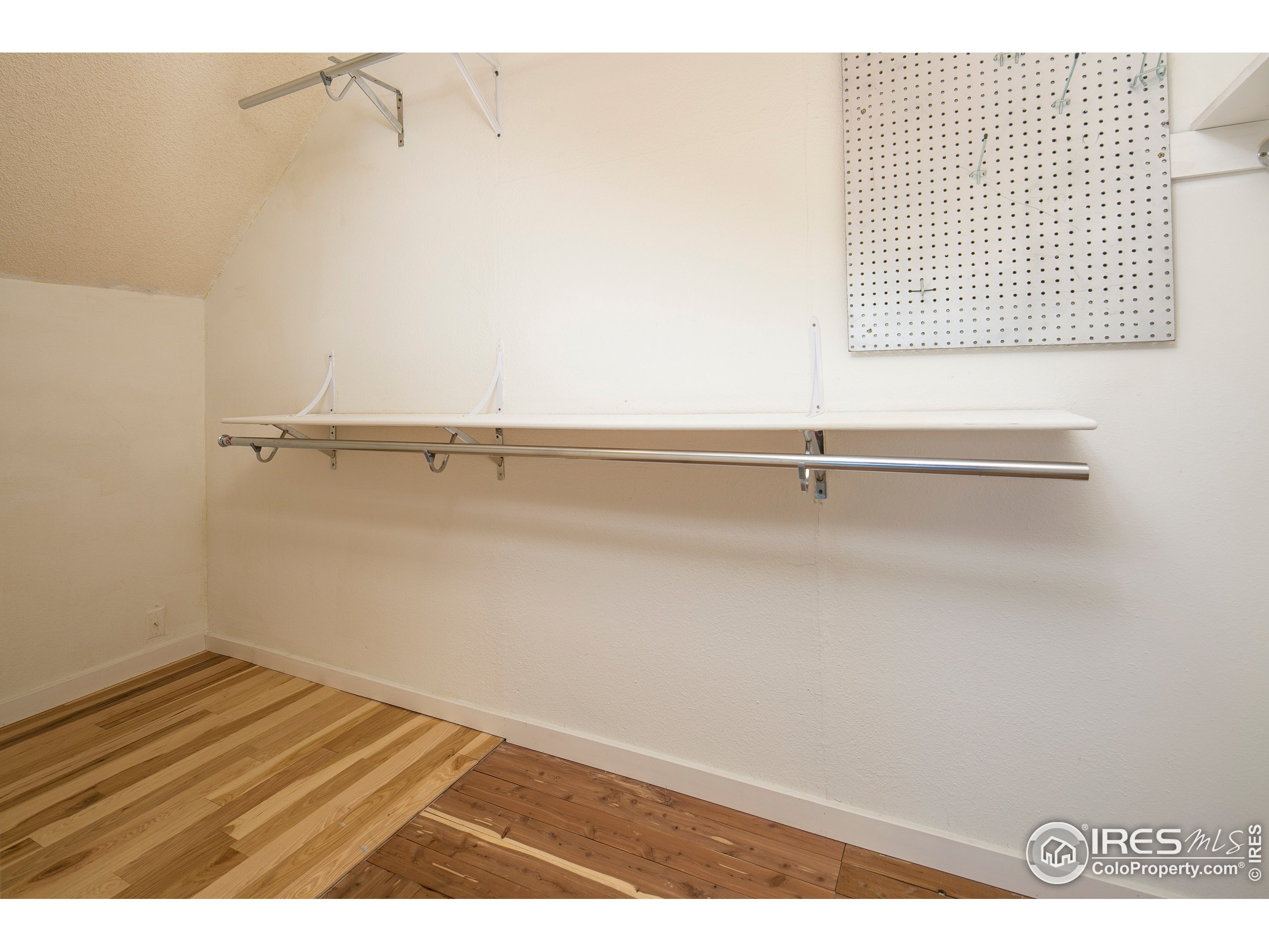 595 West Street Louisville, CO 80027 - Photo 16 of 26 a view of a room with racks on the wall