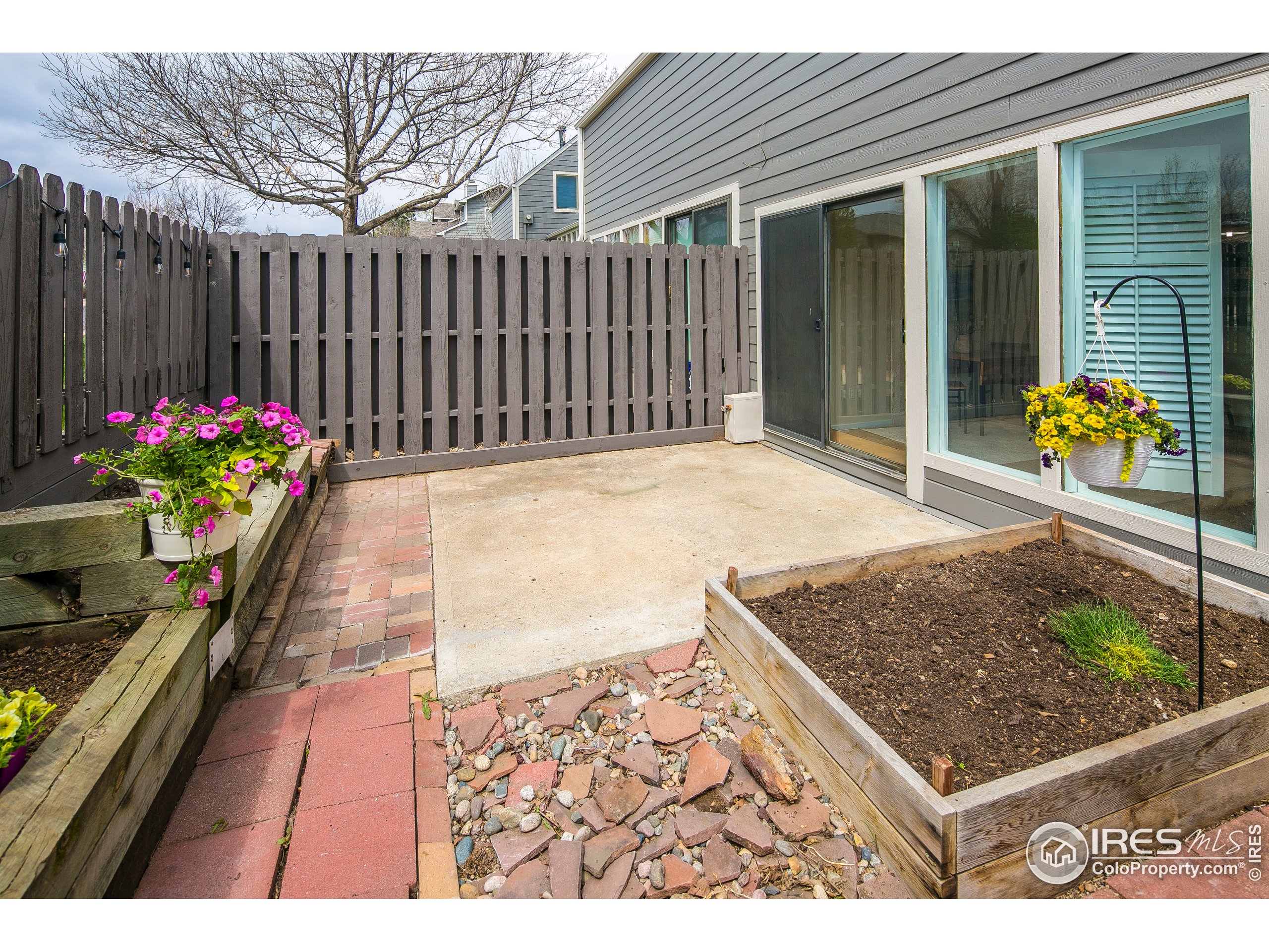 595 West Street Louisville, CO 80027 - Photo 23 of 26 a outdoor space with potted plants