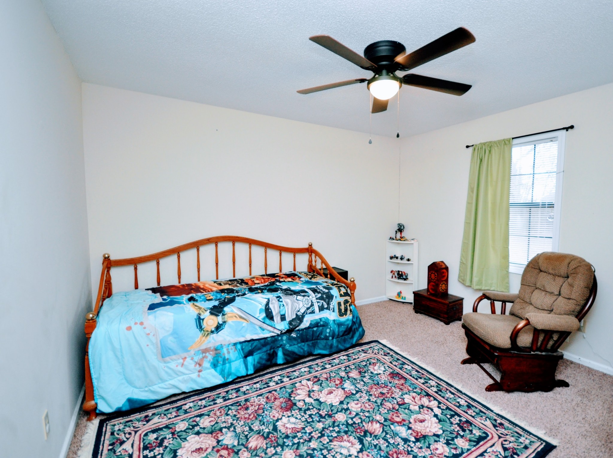 290 Lakeview Manor Road Springville, TN 38256 - Photo 14 of 36 a bed room with furniture and a window