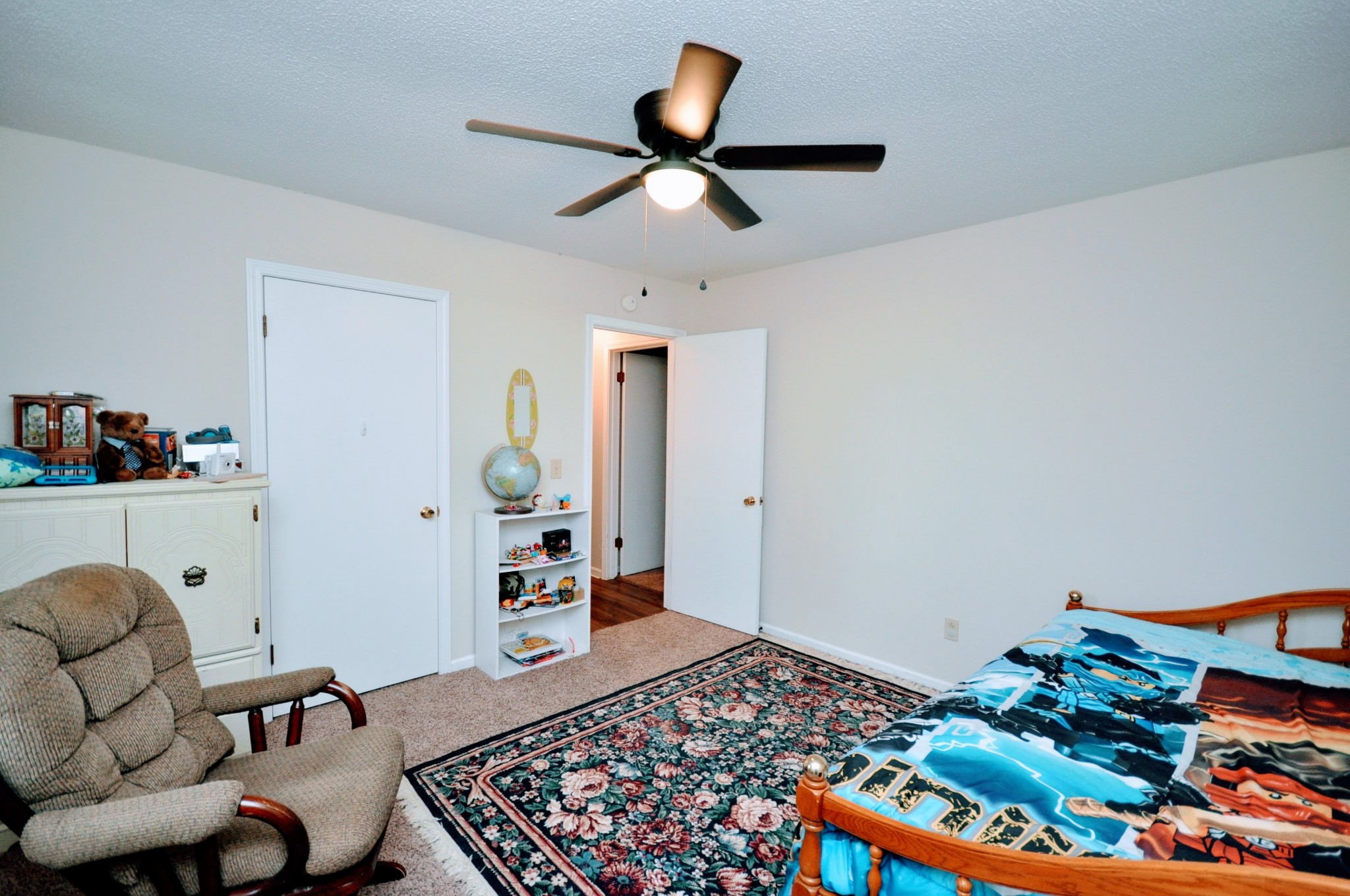 290 Lakeview Manor Road Springville, TN 38256 - Photo 17 of 36 a bedroom with furniture and a rug