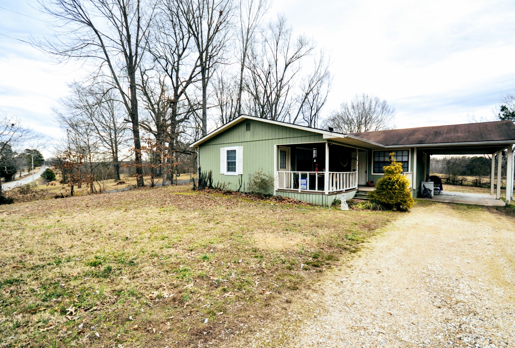 290 Lakeview Manor Road Springville, TN 38256 - Photo 26 of 36 a front view of a house with a yard