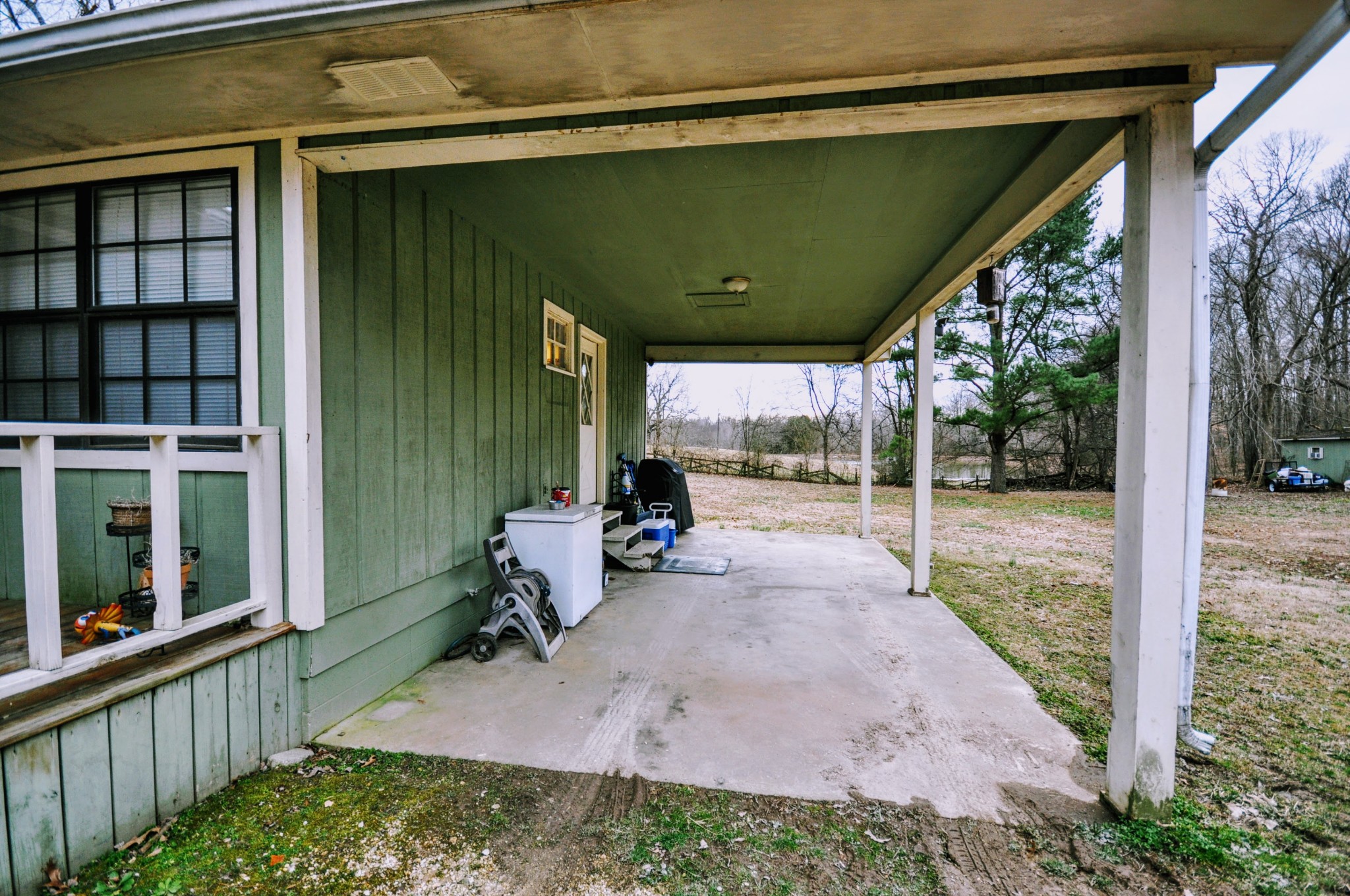 290 Lakeview Manor Road Springville, TN 38256 - Photo 29 of 36 a view of a porch with furniture and garden