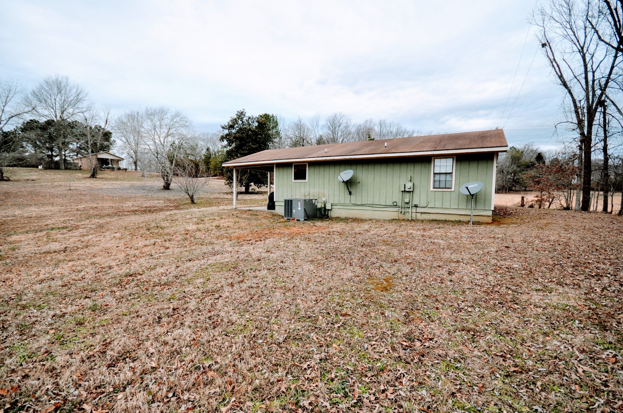 290 Lakeview Manor Road Springville, TN 38256 - Photo 32 of 36 a front view of a house with a yard