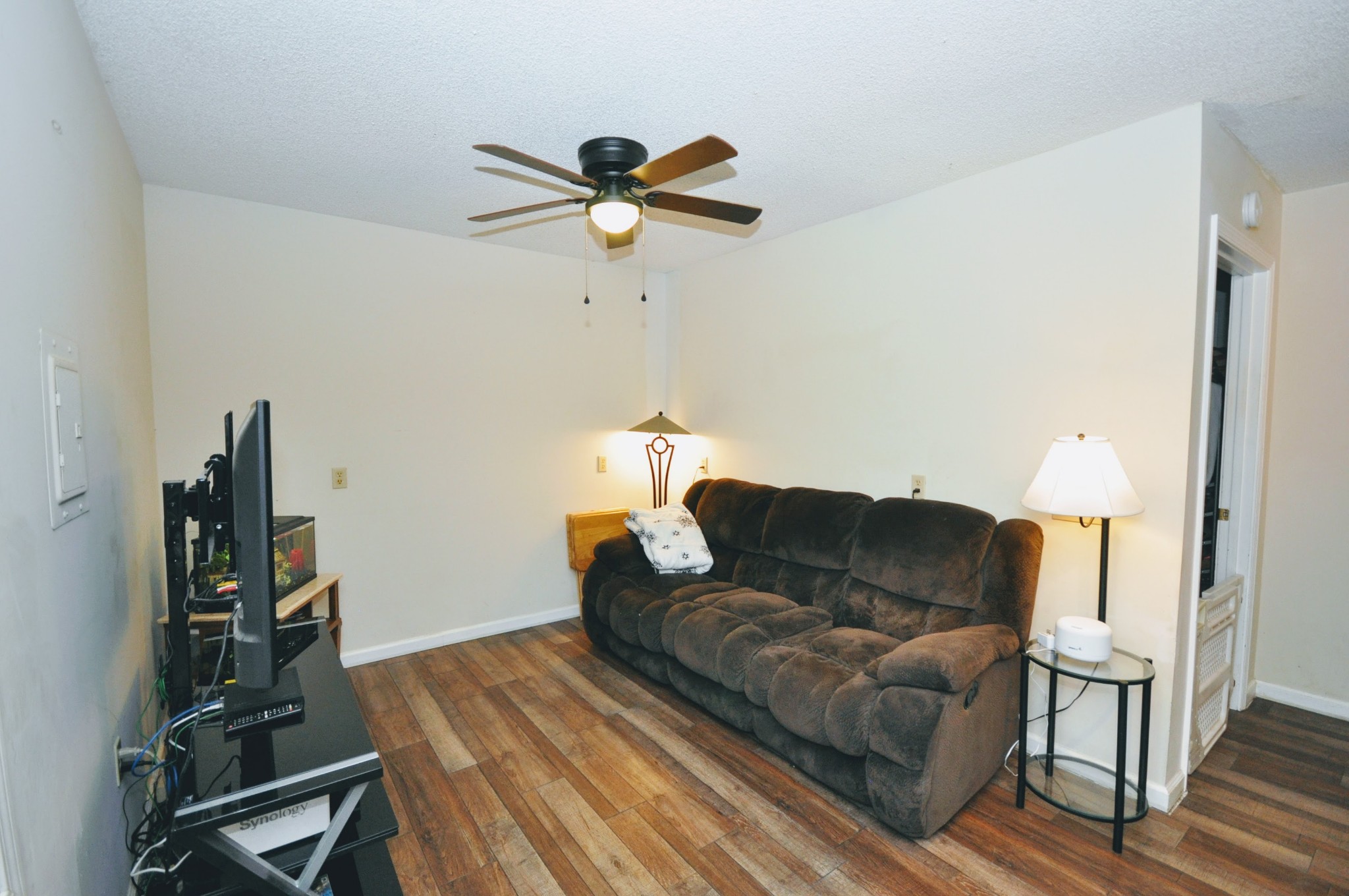 290 Lakeview Manor Road Springville, TN 38256 - Photo 6 of 36 a living room with furniture and a wooden floor