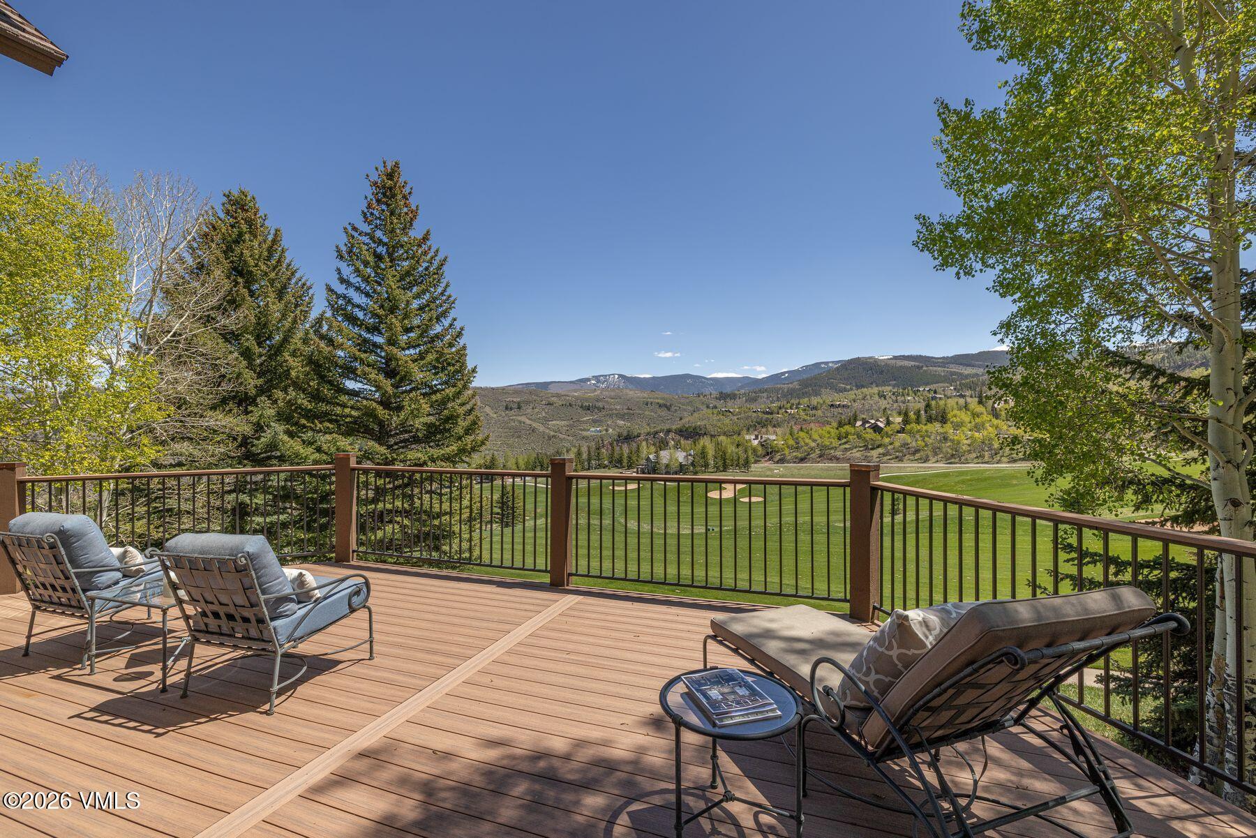167 Saddle Ridge Edwards, CO 81632 - Photo 11 of 41 a view of a balcony with chair and wooden floor