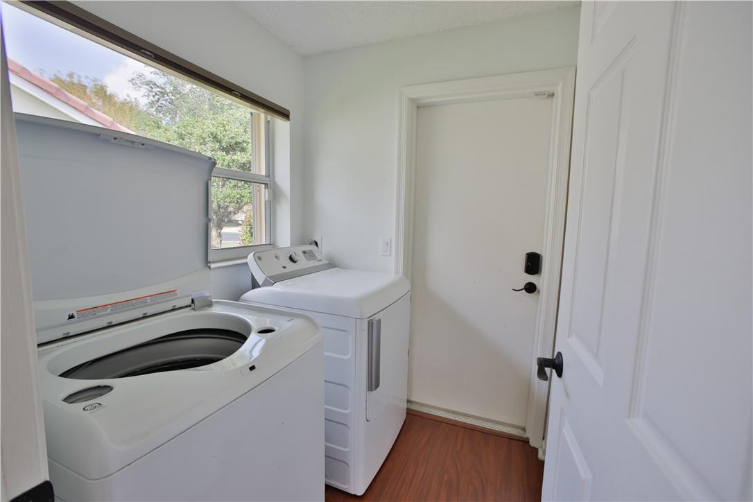 108 West Lee Road Delray Beach, FL 33445 - Photo 11 of 32 a utility room with dryer and washer