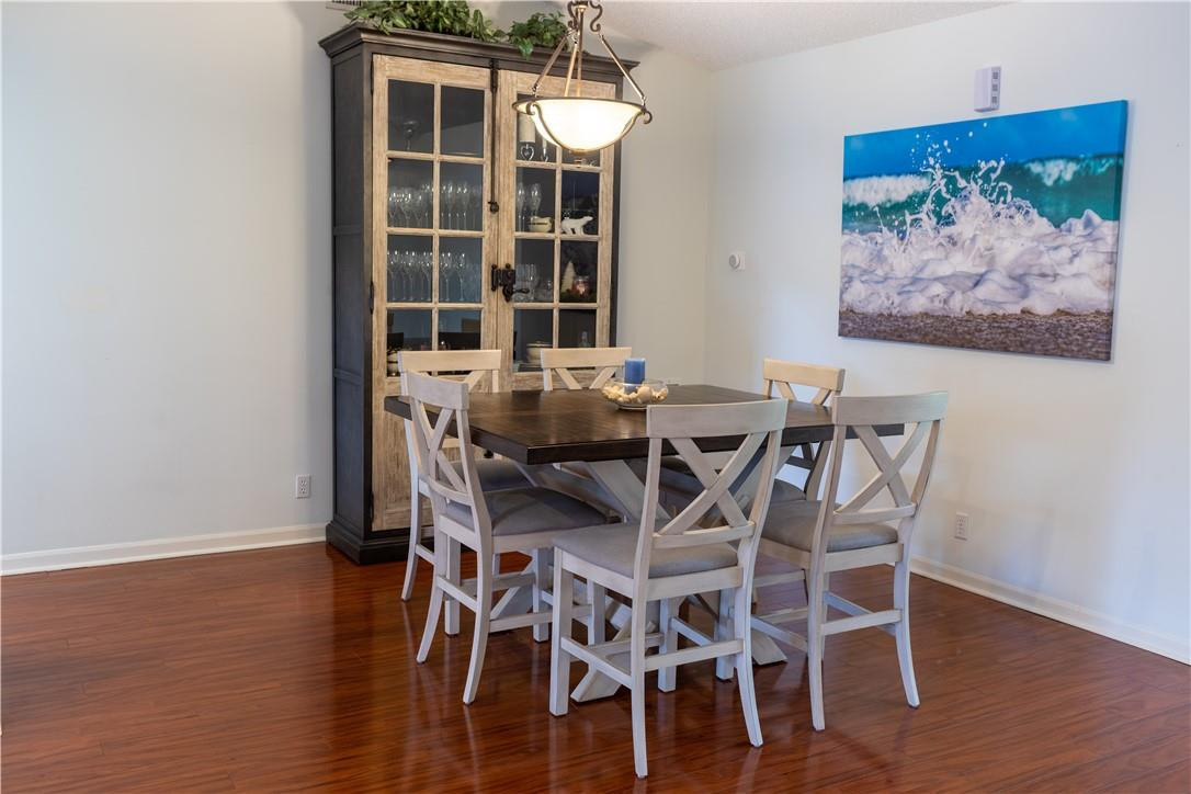 108 West Lee Road Delray Beach, FL 33445 - Photo 12 of 32 a view of a dining room with furniture window and wooden floor