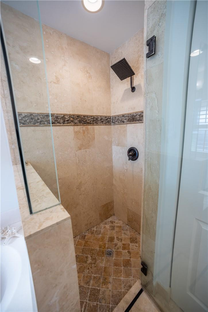 108 West Lee Road Delray Beach, FL 33445 - Photo 20 of 32 a bathroom with a shower