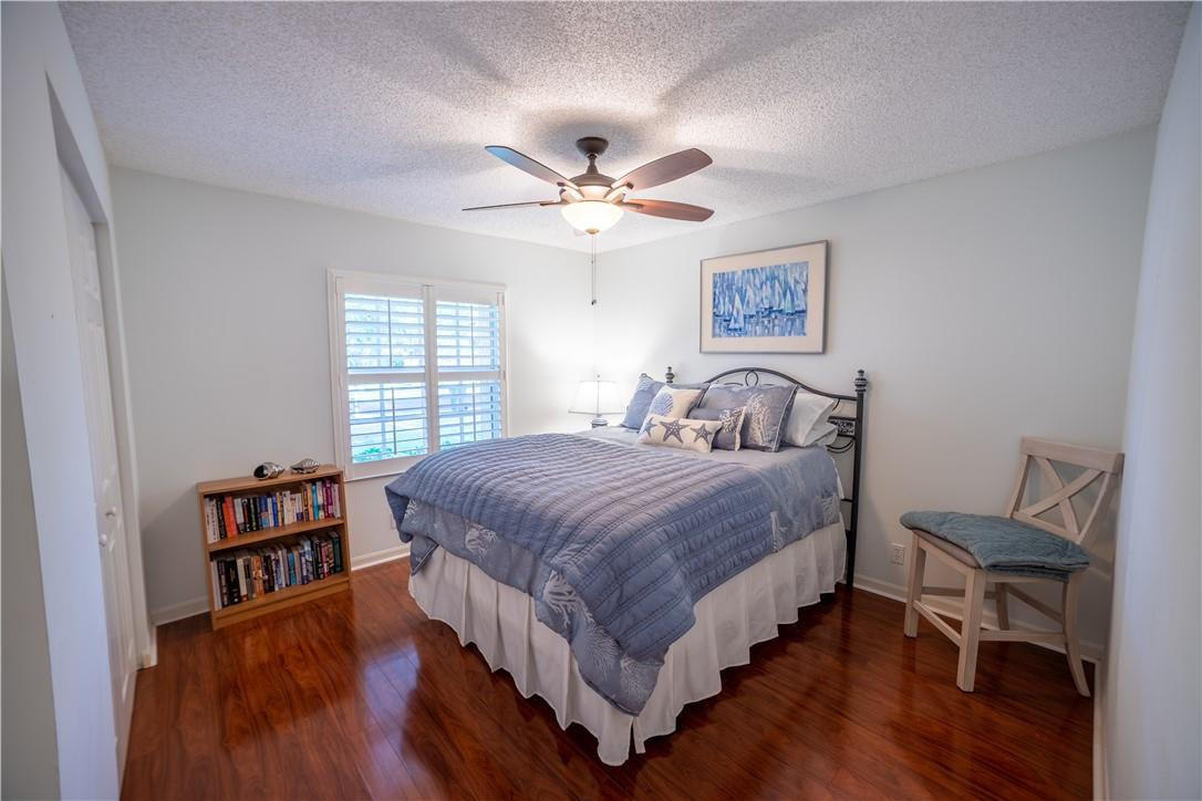 108 West Lee Road Delray Beach, FL 33445 - Photo 22 of 32 a bedroom with a bed furniture and a window