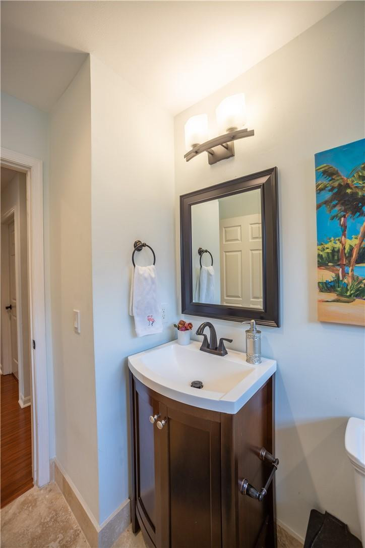 108 West Lee Road Delray Beach, FL 33445 - Photo 24 of 32 a bathroom with a sink and a mirror