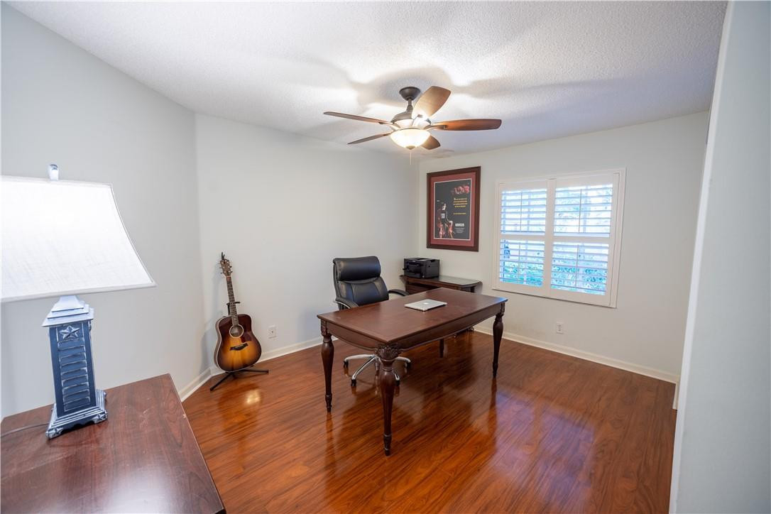 108 West Lee Road Delray Beach, FL 33445 - Photo 25 of 32 a view of a workspace with furniture and a window
