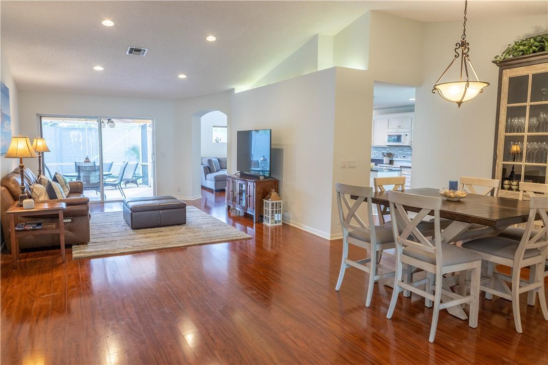 108 West Lee Road Delray Beach, FL 33445 - Photo 4 of 32 a living room with furniture dining table and wooden floor